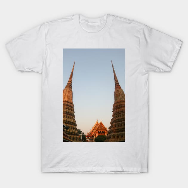 Part view from two stupa against clear sky at Wat Pho Buddha temple. T-Shirt by kall3bu